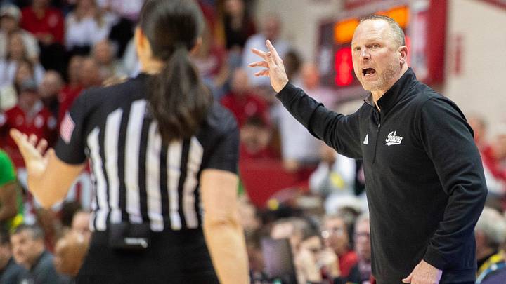 Indiana Head Coach Darian DeVries talks with a referee during the Indiana versus Oregon men's basketball game at Simon Skjodt Assembly Hall on Monday, Feb. 9, 2026.