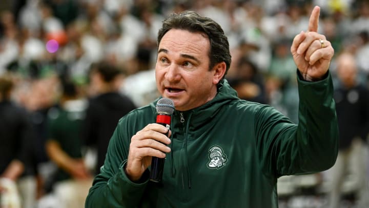 Michigan State's new football coach Jonathan Smith speaks to the crowd during a timeout in the basketball game against Georgia Southern on Tuesday, Nov. 28, 2023, at the Breslin Center in East Lansing.