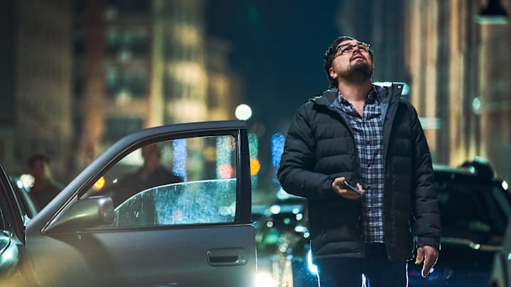 Dr. Randall Mindy (Leonardo DiCaprio) looks out for asteroids in the climate change satire 'Don't Look Up.'