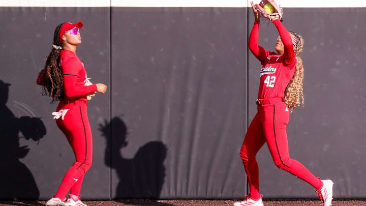Texas Tech's Mihyia Davis catches a fly ball as teammate Desirae Spearman looks on during a Big 12 Conference softball game, Friday, April 3, 2026, at Tracy Sellers Field.