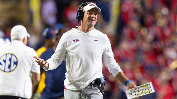 Oct 12, 2024; Baton Rouge, Louisiana, USA;  Mississippi Rebels head coach Lane Kiffin reacts after a play against the LSU Tigers during the second half at Tiger Stadium. Mandatory Credit: Stephen Lew-Imagn Images