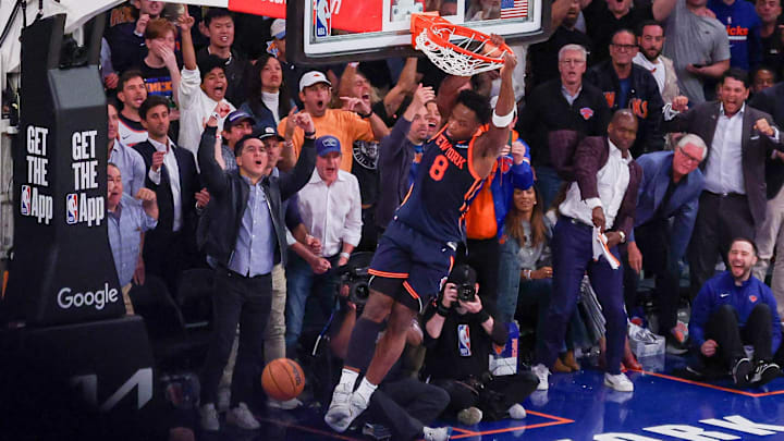 May 12, 2025; New York, New York, USA; New York Knicks forward OG Anunoby (8) dunks the ball as fans celebrate in the second half during game four of the second round for the 2025 NBA Playoffs against the Boston Celtics at Madison Square Garden. Mandatory Credit: Vincent Carchietta-Imagn Images