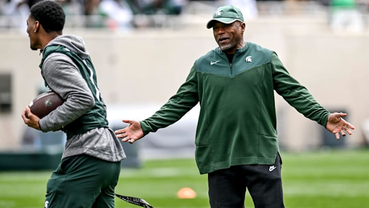 Michigan State's Michigan State's wide receivers coach Courtney Hawkins, right, talks with Jaden Mangham during the Spring Showcase on Saturday, April 20, 2024, at Spartan Stadium in East Lansing.