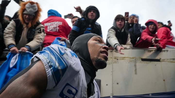 Amon-Ra St. Brown leaves Soldier Field to the cheers of Lions fans in Chicago after this season's Detroit victory.