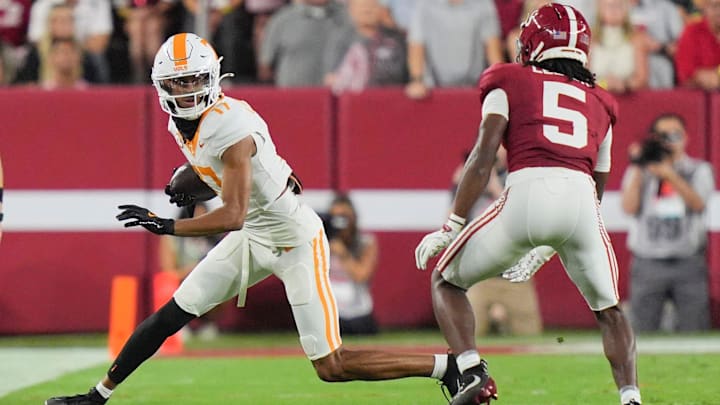 Tennessee wide receiver Chris Brazzell II (17) tries to get past Alabama defensive back Dijon Lee Jr. (5) during a college football game at Bryant-Denny Stadium in Tuscaloosa, Ala., on Oct. 18, 2025.