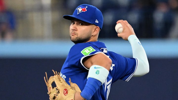 May 21, 2025; Toronto, Ontario, CAN;  Toronto Blue Jays shortstop Bo Bichette (11) warms up before playing the San Diego Padres at Rogers Centre. Mandatory Credit: Dan Hamilton-Imagn Images