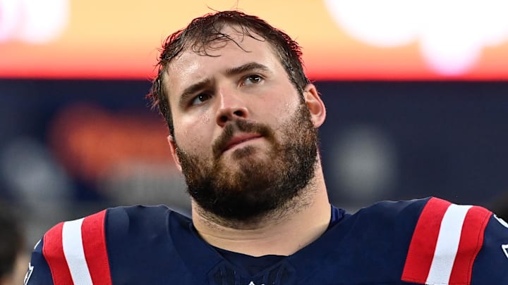 Former Michigan Wolverines standout Andrew Stueber was drafted by the New England Patriots in 2022 and signed with the Atlanta Falcons on Tuesday.