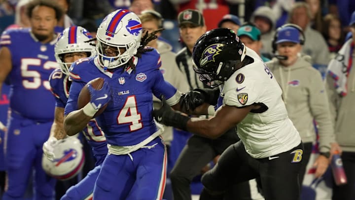Bills running back James Cook breaks free and runs for several yards duringtheir game against the Ravens.