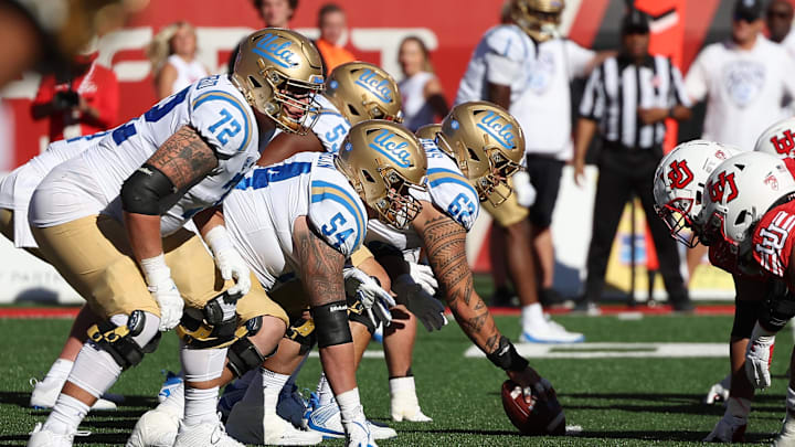 Sep 23, 2023; Salt Lake City, Utah, USA; UCLA Bruins offense lines up against the Utah Utes defense in the fourth quarter at Rice-Eccles Stadium. Mandatory Credit: Rob Gray-Imagn Images