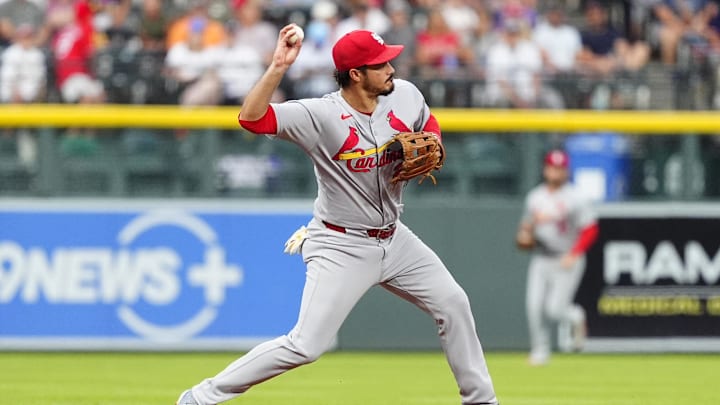 Jul 22, 2025; Denver, Colorado, USA; St. Louis Cardinals third baseman Nolan Arenado (28) fields the ball in the first inning against the Colorado Rockies at Coors Field. Mandatory Credit: Ron Chenoy-Imagn Images Jul 22, 2025; Denver, Colorado, USA; St. Louis Cardinals third baseman Nolan Arenado (28) fields the ball in the first inning against the Colorado Rockies at Coors Field. Mandatory Credit: Ron Chenoy-Imagn Images