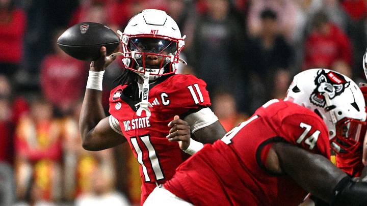 Nov 1, 2025; Raleigh, North Carolina, USA; North Carolina State Wolfpack quarter back CJ Bailey (11) throws a pass during the first quarter against the Georgia Tech Yellow Jackets at Carter-Finley Stadium. Mandatory Credit: Zachary Taft-Imagn Images Nov 1, 2025; Raleigh, North Carolina, USA; North Carolina State Wolfpack quarter back CJ Bailey (11) throws a pass during the first quarter against the Georgia Tech Yellow Jackets at Carter-Finley Stadium. Mandatory Credit: Zachary Taft-Imagn Images