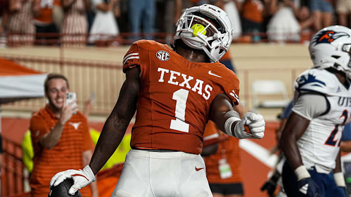 Johntay Cook II celebrates a touchdown catch for Texas early in the 2024 season. Johntay Cook II celebrates a touchdown catch for Texas early in the 2024 season.