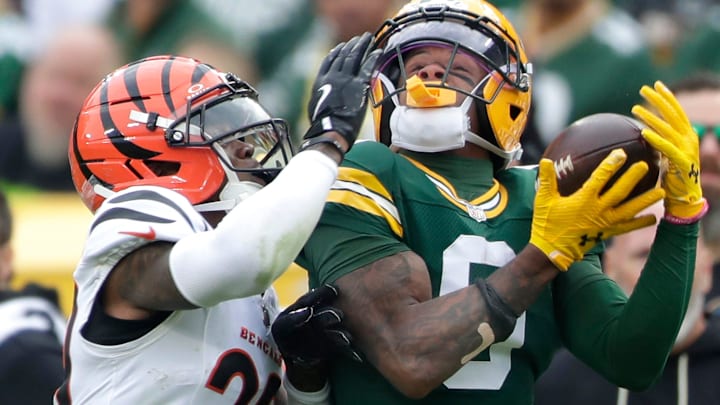 Green Bay Packers wide receiver Matthew Golden (0) catches a pass over the defense of Cincinnati Bengals CB Cam Taylor-Britt Green Bay Packers wide receiver Matthew Golden (0) catches a pass over the defense of Cincinnati Bengals CB Cam Taylor-Britt