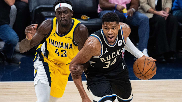 Nov 3, 2025; Indianapolis, Indiana, USA; Milwaukee Bucks forward Giannis Antetokounmpo (34) dribbles against Indiana Pacers forward Pascal Siakam (43) in the first half at Gainbridge Fieldhouse. Mandatory Credit: Trevor Ruszkowski-Imagn Images Nov 3, 2025; Indianapolis, Indiana, USA; Milwaukee Bucks forward Giannis Antetokounmpo (34) dribbles against Indiana Pacers forward Pascal Siakam (43) in the first half at Gainbridge Fieldhouse. Mandatory Credit: Trevor Ruszkowski-Imagn Images