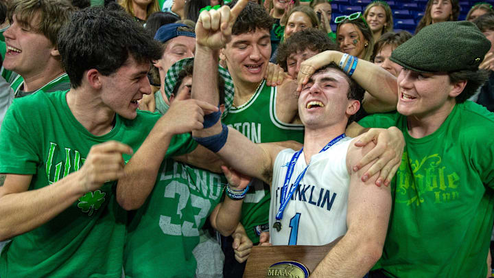Franklin High School senior Caden Sullivan celebrates the win over Newton North, 55-52, in the Div. 1 state championship at the Tsongas Center in Lowell, March 16, 2025.