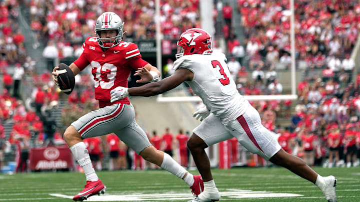 Sep 09, 2023; Columbus, OH, USA; Ohio State Buckeyes quarterback Devin Brown (33) is sacked by Sep 09, 2023; Columbus, OH, USA; Ohio State Buckeyes quarterback Devin Brown (33) is sacked by