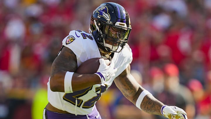 Baltimore Ravens running back Derrick Henry (22) runs the ball during the first half against the Kansas City Chiefs at GEHA Field at Arrowhead Stadium. 