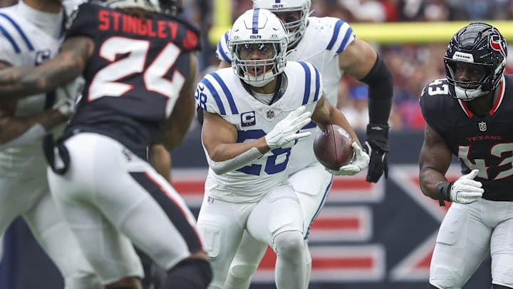 Oct 27, 2024; Houston, Texas, USA; Indianapolis Colts running back Jonathan Taylor (28) runs with the ball during the game against the Houston Texans at NRG Stadium. Mandatory Credit: Troy Taormina-Imagn Images