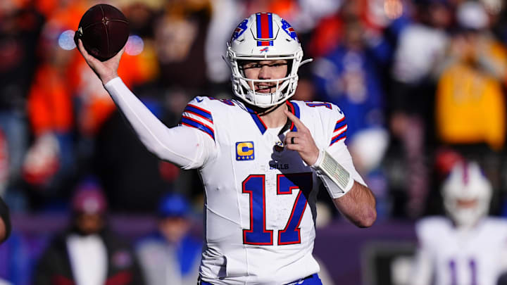 Buffalo Bills quarterback Josh Allen (17) throws during the first quarter of an AFC Divisional Round playoff game against the Denver Broncos at Empower Field at Mile High.