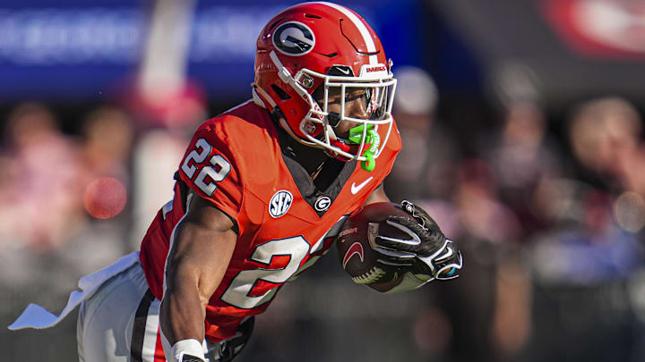 Oct 12, 2024; Athens, Georgia, USA; Georgia Bulldogs running back Branson Robinson (22) runs the ball against the Mississippi State Bulldogs at Sanford Stadium. Mandatory Credit: Dale Zanine-Imagn Images