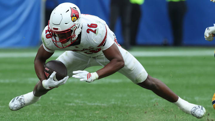 Sep 27, 2025; Pittsburgh, Pennsylvania, USA; Louisville Cardinals running back Duke Watson (26) runs the ball against the Pittsburgh Panthers during the fourth quarter at Acrisure Stadium. Mandatory Credit: Charles LeClaire-Imagn Images Sep 27, 2025; Pittsburgh, Pennsylvania, USA; Louisville Cardinals running back Duke Watson (26) runs the ball against the Pittsburgh Panthers during the fourth quarter at Acrisure Stadium. Mandatory Credit: Charles LeClaire-Imagn Images