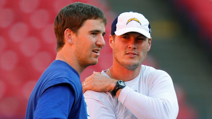 Nov 8, 2009; East Rutherford, NJ, USA;  New York Giants quarterback Eli Manning (left) and San Diego Chargers quarterback Philip Rivers talk prior to game at Giants Stadium. Mandatory Credit: Jim O'Connor-Imagn Images
