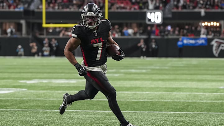 Jan 5, 2025; Atlanta, Georgia, USA; Atlanta Falcons running back Bijan Robinson (7) runs for a touchdown against the Carolina Panthers during the second half at Mercedes-Benz Stadium. Mandatory Credit: Dale Zanine-Imagn Images Jan 5, 2025; Atlanta, Georgia, USA; Atlanta Falcons running back Bijan Robinson (7) runs for a touchdown against the Carolina Panthers during the second half at Mercedes-Benz Stadium. Mandatory Credit: Dale Zanine-Imagn Images