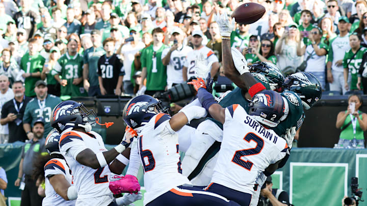 Oct 5, 2025; Philadelphia, Pennsylvania, USA; Philadelphia Eagles wide receivers A.J. Brown (11)] and Devonta Smith (6) reach for an incomplete pass on the final play of the game against the Denver Broncos at Lincoln Financial Field. 