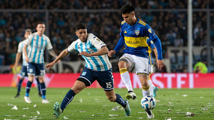 Guillermo Fernandez of Boca Juniors and Maxi Romero of...