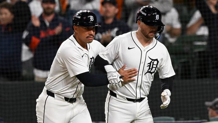 Oct 7, 2025; Detroit, Michigan, USA; Detroit Tigers right fielder Jahmai Jones (18) and catcher Jake Rogers (34) celebrate after both score runs on a double in the ninth inning against the Seattle Mariners during game three of the ALDS round for the 2025 MLB playoffs at Comerica Park. Mandatory Credit: Lon Horwedel-Imagn Images Oct 7, 2025; Detroit, Michigan, USA; Detroit Tigers right fielder Jahmai Jones (18) and catcher Jake Rogers (34) celebrate after both score runs on a double in the ninth inning against the Seattle Mariners during game three of the ALDS round for the 2025 MLB playoffs at Comerica Park. Mandatory Credit: Lon Horwedel-Imagn Images