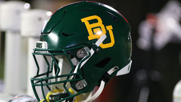 Oct 29, 2022; Lubbock, Texas, USA;  A general view of a Baylor Bears helmet on the bench in the second half during the game against the Texas Tech Red Raiders at Jones AT&T Stadium and Cody Campbell Field. Mandatory Credit: Michael C. Johnson-Imagn Images