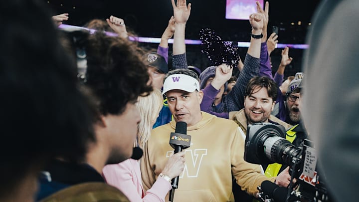 UW coach Jedd Fisch does an NBC TV interview after beating Michigan. 