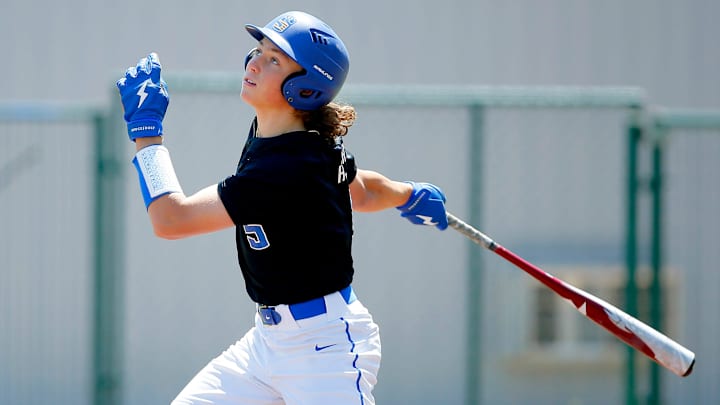 Ethan Holliday hits during a Stillwater High School baseball game in Stillwater, Okla., Saturday, April 30, 2022.