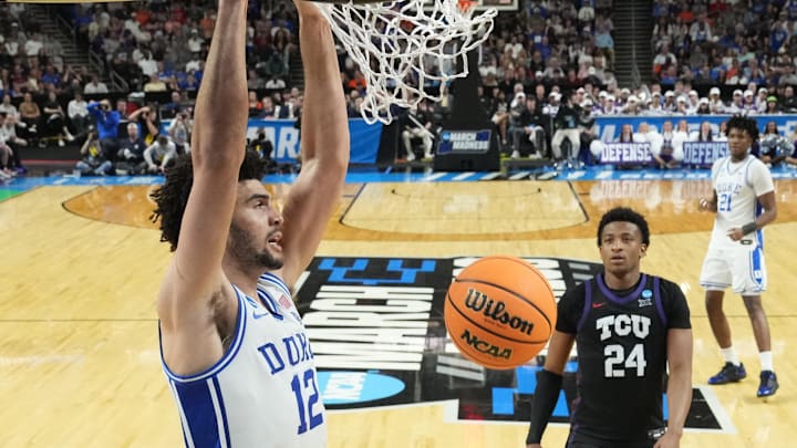 Mar 21, 2026; Greenville, SC, USA; Duke Blue Devils forward Cameron Boozer (12) scores in the second half during a second-round game of the men's 2026 NCAA Tournament at Bon Secours Wellness Arena. Mandatory Credit: Bob Donnan-Imagn Images