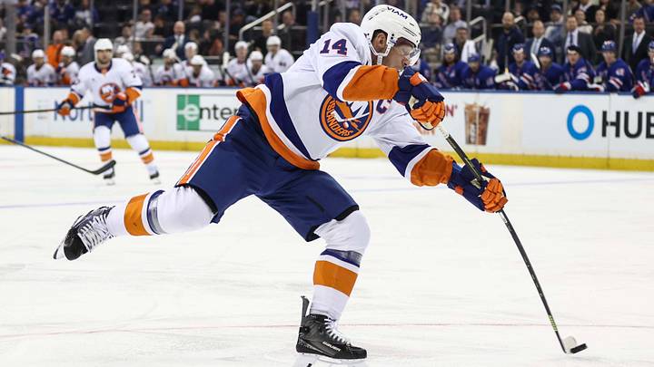 Sep 22, 2026; New York, New York, USA;  New York Islanders center Bo Horvat (14) attempts a shot on goal in the first period against the New York Rangers at Madison Square Garden.  Mandatory Credit: Wendell Cruz-Imagn Images