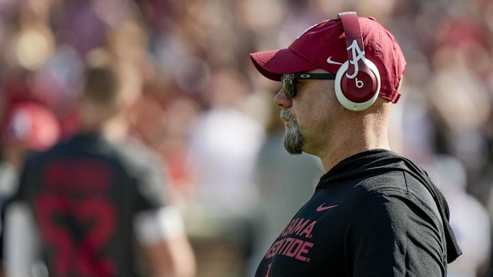 Nov 15, 2025; Tuscaloosa, Alabama, USA; Alabama offensive coordinator Ryan Grubb watches the Crimson Tide stretch before the game with Oklahoma at Saban Field at Bryant-Denny Stadium at Saban Field at Bryant-Denny Stadium. Mandatory Credit: Gary Cosby