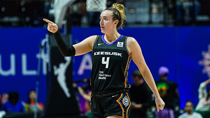 Oct 6, 2024; Uncasville, Connecticut, USA; Connecticut Sun guard Marina Mabrey (4) reacts after her basket against the Minnesota Lynx in the second half during game four of the 2024 WNBA Semi-finals at Mohegan Sun Arena. Mandatory Credit: David Butler II-Imagn Images Oct 6, 2024; Uncasville, Connecticut, USA; Connecticut Sun guard Marina Mabrey (4) reacts after her basket against the Minnesota Lynx in the second half during game four of the 2024 WNBA Semi-finals at Mohegan Sun Arena. Mandatory Credit: David Butler II-Imagn Images