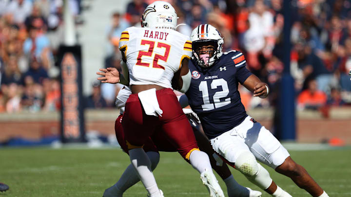 Nov 16, 2024; Auburn, Alabama, USA; Auburn Tigers linebacker Dorian Mausi Jr. (12) closes in on Louisiana Monroe Warhawks running back Ahmad Hardy (22) during the first quarter at Jordan-Hare Stadium. Mandatory Credit: John Reed-Imagn Images Nov 16, 2024; Auburn, Alabama, USA; Auburn Tigers linebacker Dorian Mausi Jr. (12) closes in on Louisiana Monroe Warhawks running back Ahmad Hardy (22) during the first quarter at Jordan-Hare Stadium. Mandatory Credit: John Reed-Imagn Images