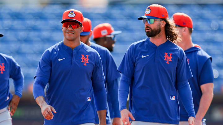 Feb 19, 2025; Port St. Lucie, FL, USA; New York Mets right fielder Juan Soto (22) and left fielder Jesse Winker (3) looks on during a spring training workout at Clover Park. Mandatory Credit: Sam Navarro-Imagn Images