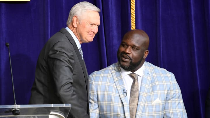 Mar 24, 2017; Los Angeles, CA, USA; Jerry West (left) shakes hands with Los Angeles Lakers former center Shaquille O'Neal during a ceremony to unveil a statue of O'Neal at Staples Center. 