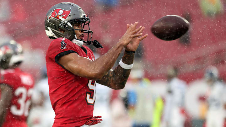 Aug 9, 2025; Tampa, Florida, USA; Tampa Bay Buccaneers wide receiver Emeka Egbuka (9) works out prior to the game against the Tennessee Titians at Raymond James Stadium. Mandatory Credit: Kim Klement Neitzel-Imagn Images