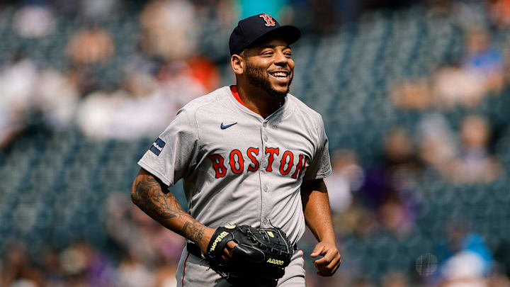 Jul 24, 2024; Denver, Colorado, USA; Boston Red Sox first baseman Dominic Smith (2) reacts after pitching in the eighth inning against the Colorado Rockies at Coors Field. Mandatory Credit: Isaiah J. Downing-Imagn Images