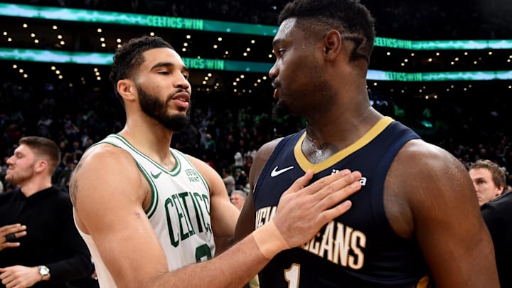 Jan 29, 2024; Boston, Massachusetts, USA;  Boston Celtics forward Jayson Tatum (0) and New Orleans Pelicans forward Zion Williamson (1) after the game at TD Garden. Mandatory Credit: Bob DeChiara-Imagn Images