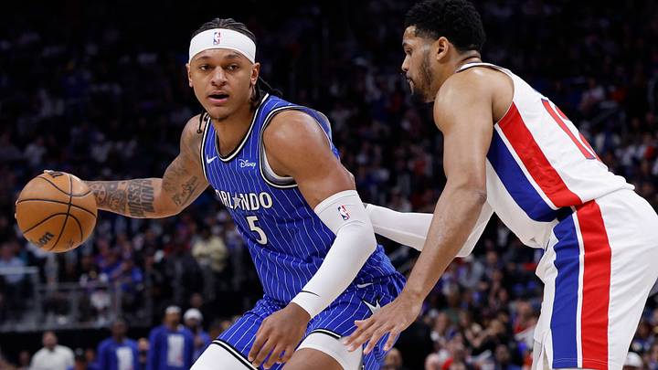 May 3, 2026; Detroit, Michigan, USA; Orlando Magic forward Paolo Banchero (5) dribbles defended by Detroit Pistons forward Tobias Harris (12) in the first half during game seven of the first round of the 2026 NBA Playoffs at Little Caesars Arena. Mandatory Credit: Rick Osentoski-Imagn Images May 3, 2026; Detroit, Michigan, USA; Orlando Magic forward Paolo Banchero (5) dribbles defended by Detroit Pistons forward Tobias Harris (12) in the first half during game seven of the first round of the 2026 NBA Playoffs at Little Caesars Arena. Mandatory Credit: Rick Osentoski-Imagn Images