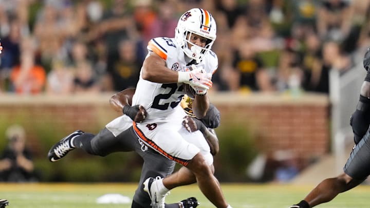 Aug 29, 2025; Waco, Texas, USA;  Auburn Tigers runningback Jeremiah Cobb (23) runs the ball against the Baylor Bears during the first half at McLane Stadium. Mandatory Credit: Chris Jones-Imagn Images