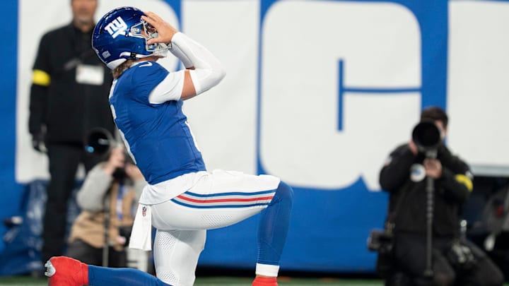 New York Giants quarterback Jaxson Dart (6) celebrates after scoring the first touchdown during a Thursday Night Football game between the New York Giants and the Philadelphia Eagles at MetLife Stadium in East Rutherford on Oct. 9, 2025.