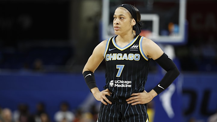 Aug 25, 2024; Chicago, Illinois, USA; Chicago Sky guard Chennedy Carter (7) looks on during the first half at Wintrust Arena. Mandatory Credit: Kamil Krzaczynski-Imagn Images