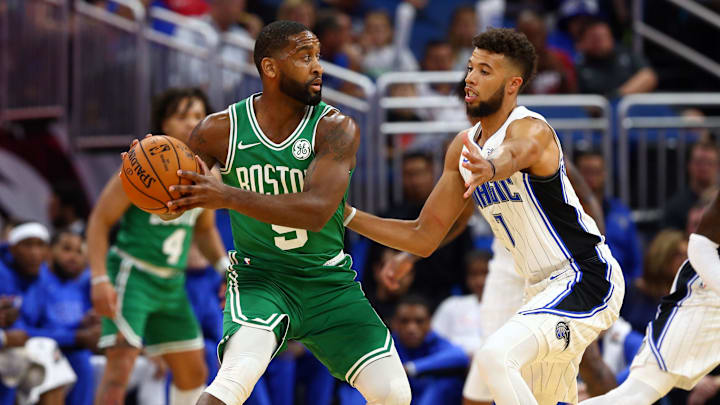 Boston Celtics guard Brad Wanamaker (9) drives to the basket against Orlando Magic guard Michael Carter-Williams (7) during the first quarter at Amway Center. Boston Celtics guard Brad Wanamaker (9) drives to the basket against Orlando Magic guard Michael Carter-Williams (7) during the first quarter at Amway Center.