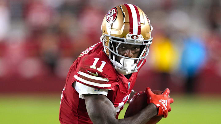 San Francisco 49ers wide receiver Brandon Aiyuk (11) runs after a catch against the New York Jets during the fourth quarter at Levi's Stadium. 