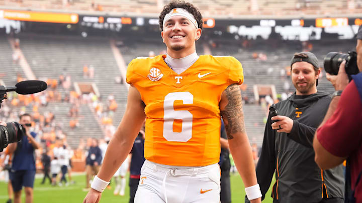Tennessee quarterback Joey Aguilar (6) smiles as he walks off the field toward his family after Tennessee's home opener against ETSU at Neyland Stadium in Knoxville, Tenn., on Sept. 6, 2025.
